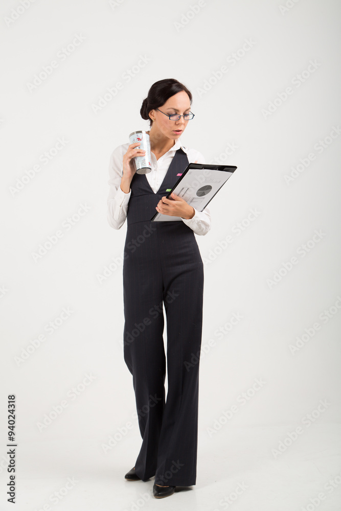 portraite of office woman with pad and cup portraite of office woman with pad and cup