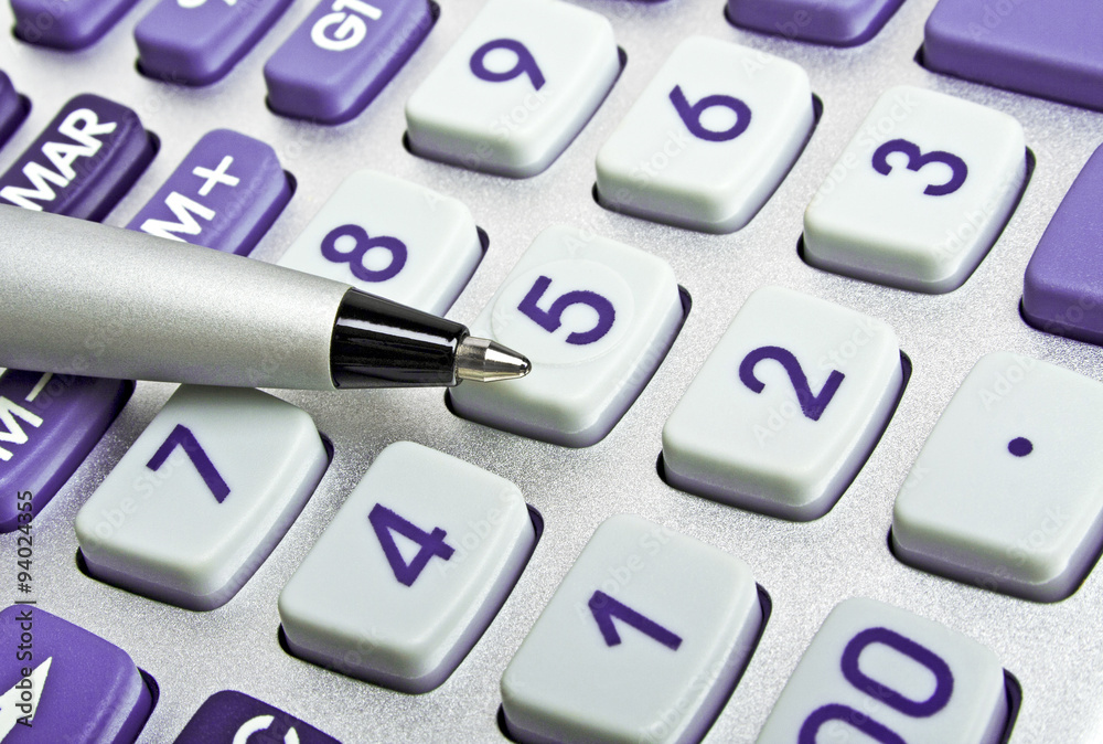 Business concept, pen and calculator keyboard Business concept, pen and calculator keyboard