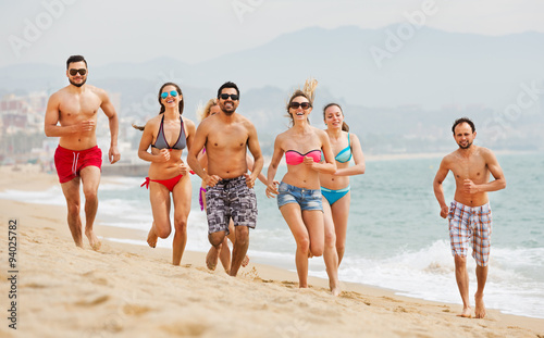 People running at beach