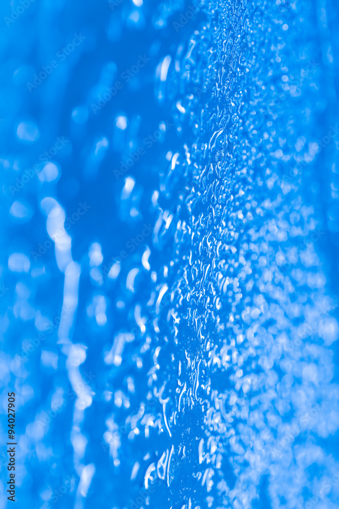 Obraz premium Drops of water on a color background. Shallow depth of field. Se