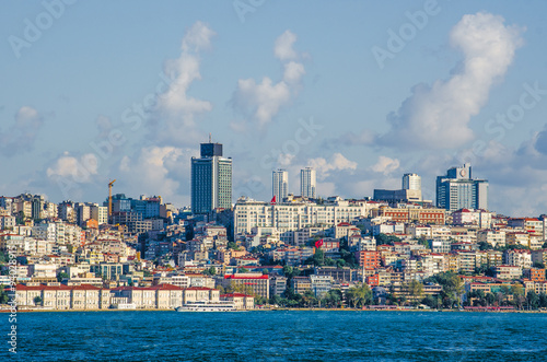 The view of Ortakoy Mosque and the houses on the Bosphorus shore from the Bosphorus bridge, Istanbul photo