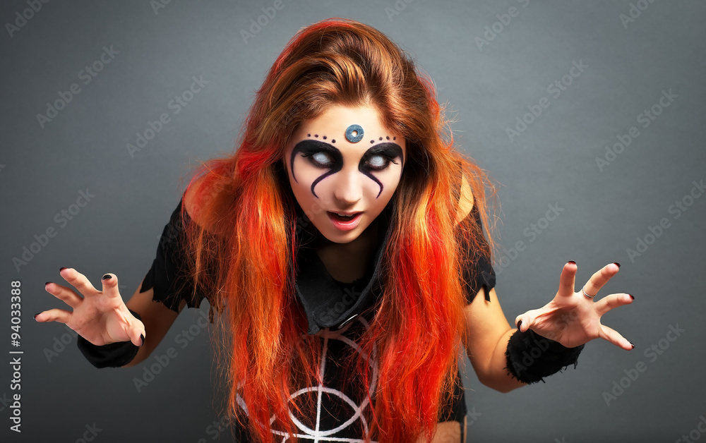 Obraz premium Portrait of scary young girl with white eyes for Halloween 