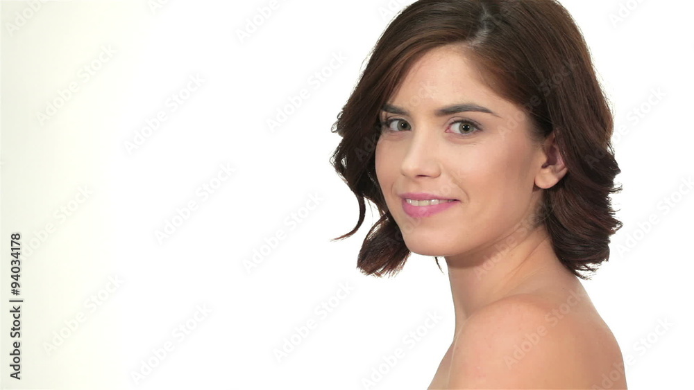 Pretty woman against a white background with copyspace Pretty woman against a white background with copyspace