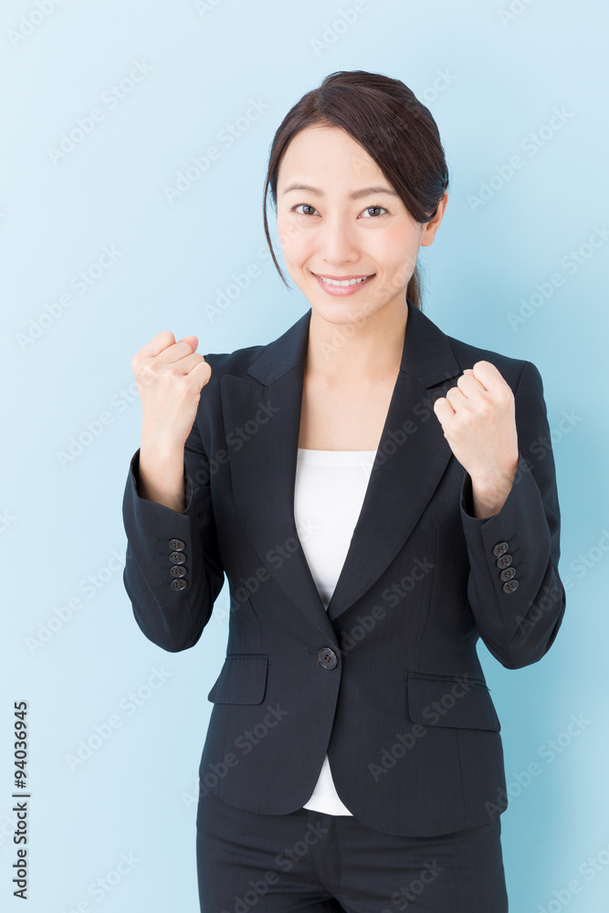 portrait of asian businesswoman on blue background portrait of asian businesswoman on blue background