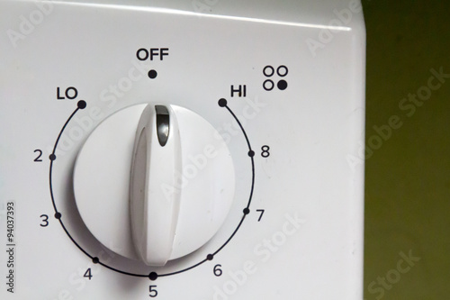 White knob on an electric oven