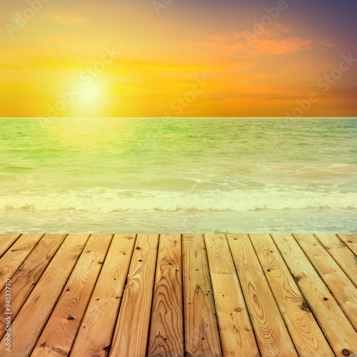 Wood table top on blurred sea
