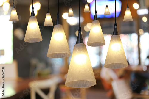Warm lighting modern ceiling lamps in the cafe.