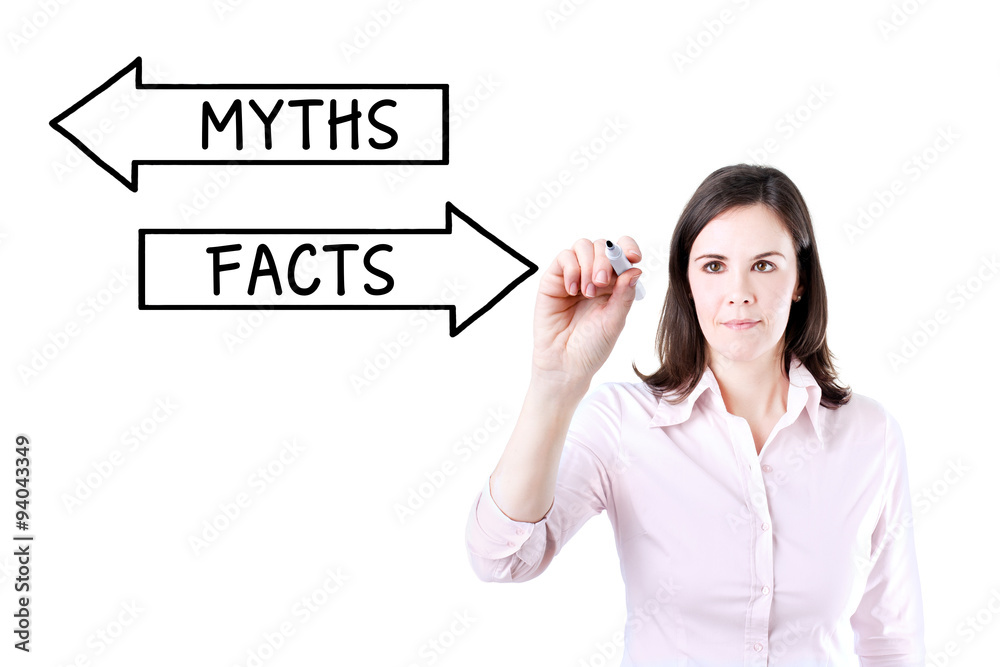 Businesswoman drawing a Myths or Facts concept on the virtual screen. Businesswoman drawing a Myths or Facts concept on the virtual screen.