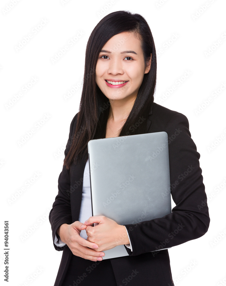 Asian Businesswoman carry with notebook computer Asian Businesswoman carry with notebook computer