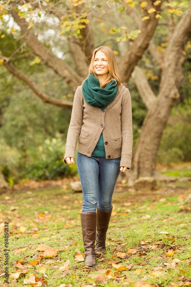 Smiling woman walking to the camera Smiling woman walking to the camera