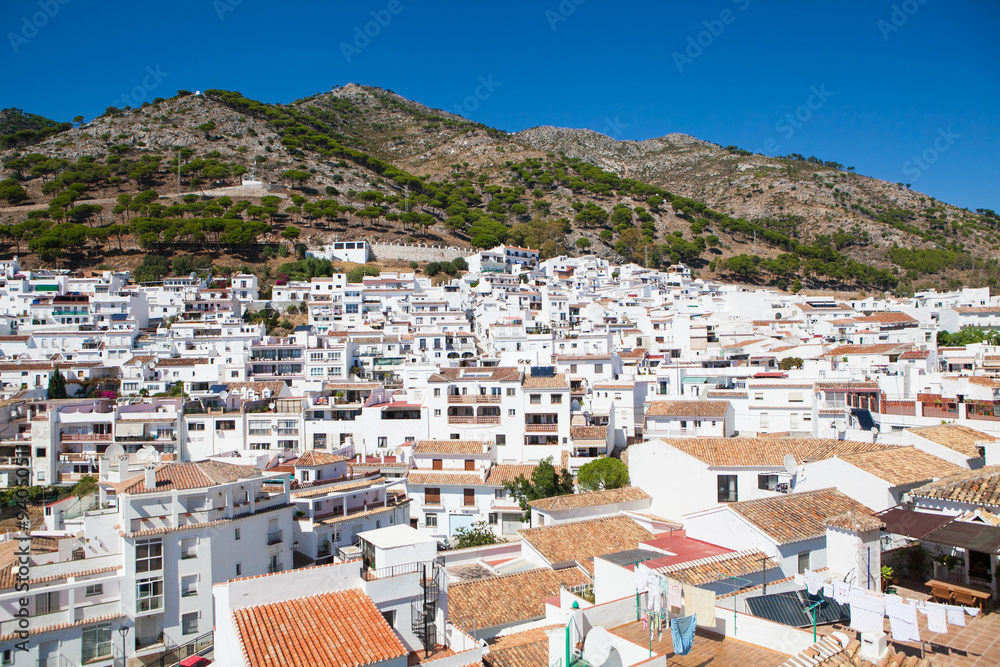 Mijas village in Andalusia, Spain. Typical white village with lot of white painted houses in the mountainside. 