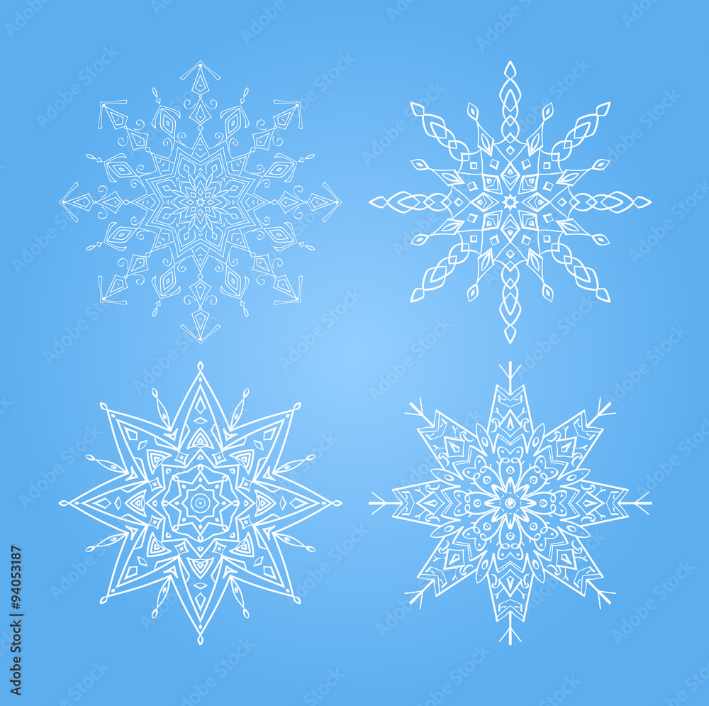 set of snowflakes on a blue background