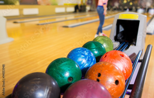 balls on ball return system in bowling club