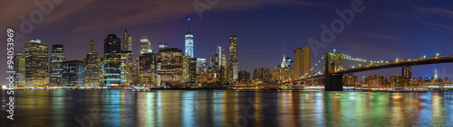 Manhattan skyline at night, New York panoramic picture, USA.
