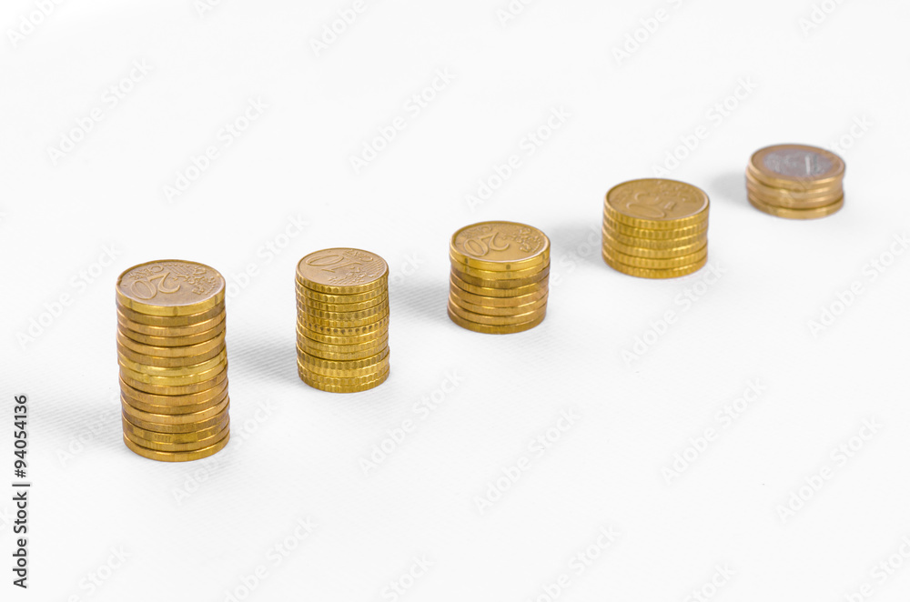 Money and business topic: Diagram of golden coins on a white background in studio Money and business topic: Diagram of golden coins on a white background in studio