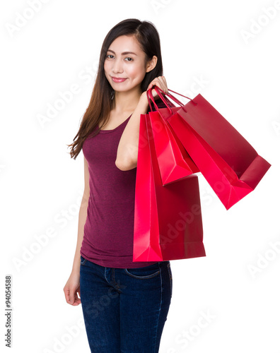 Asian young woman hold with shopping bag