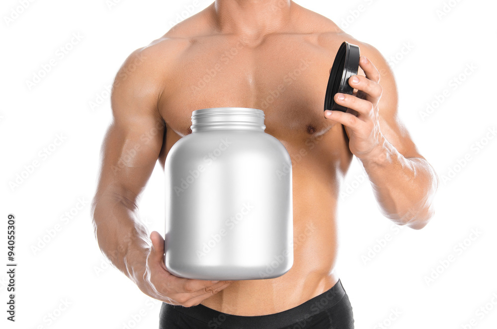Bodybuilding and Sports theme: handsome strong bodybuilder holding a ...