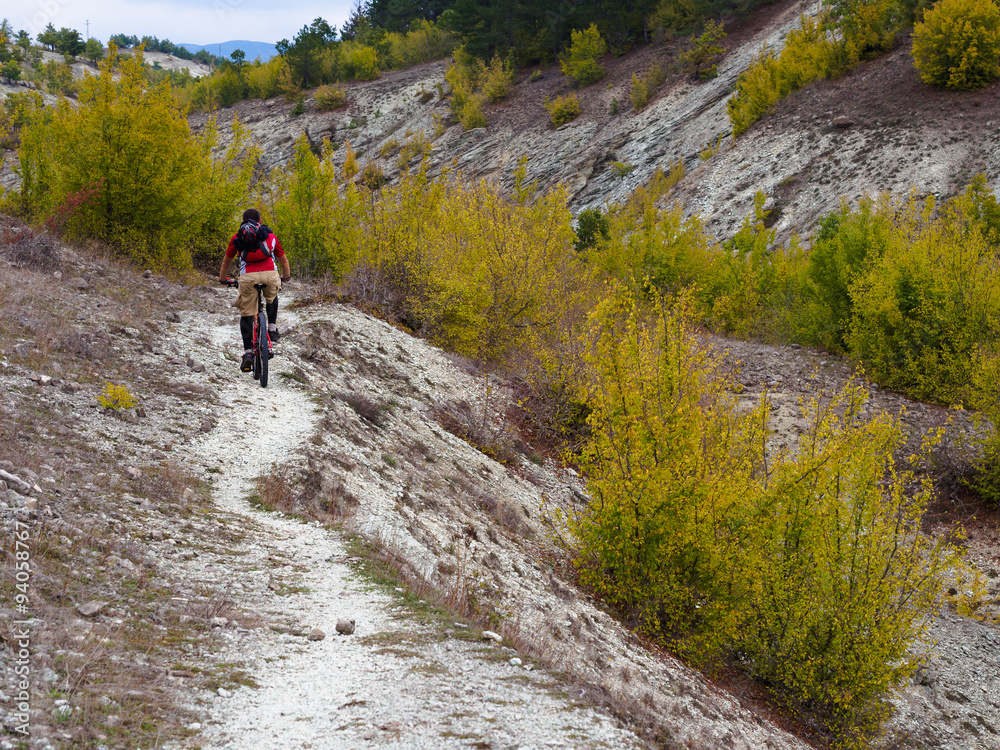 Mountain biker on a rocky singletrack
