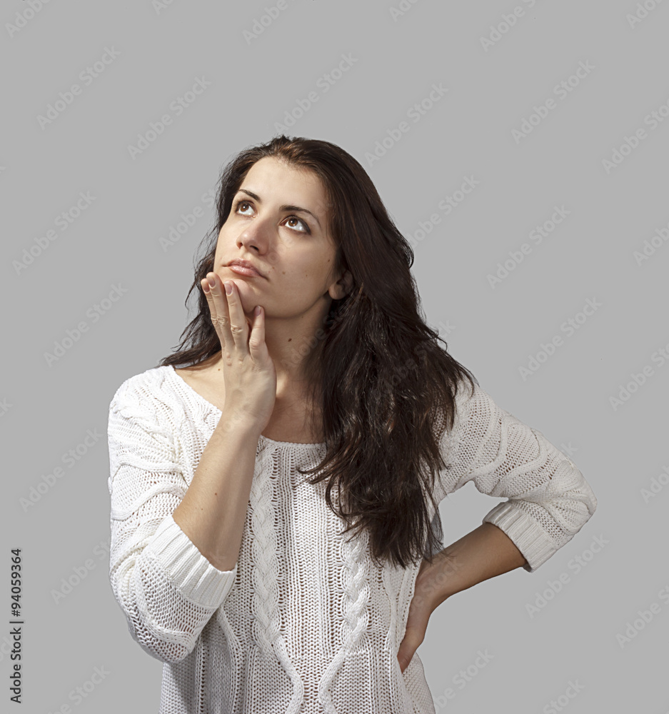 Portrait of an attractive fashionable young brunette woman. Portrait of an attractive fashionable young brunette woman.