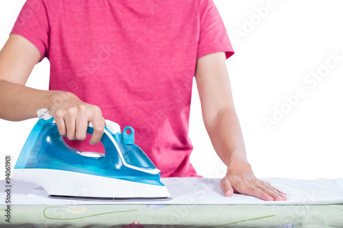 woman ironing clothes on ironing board, white background