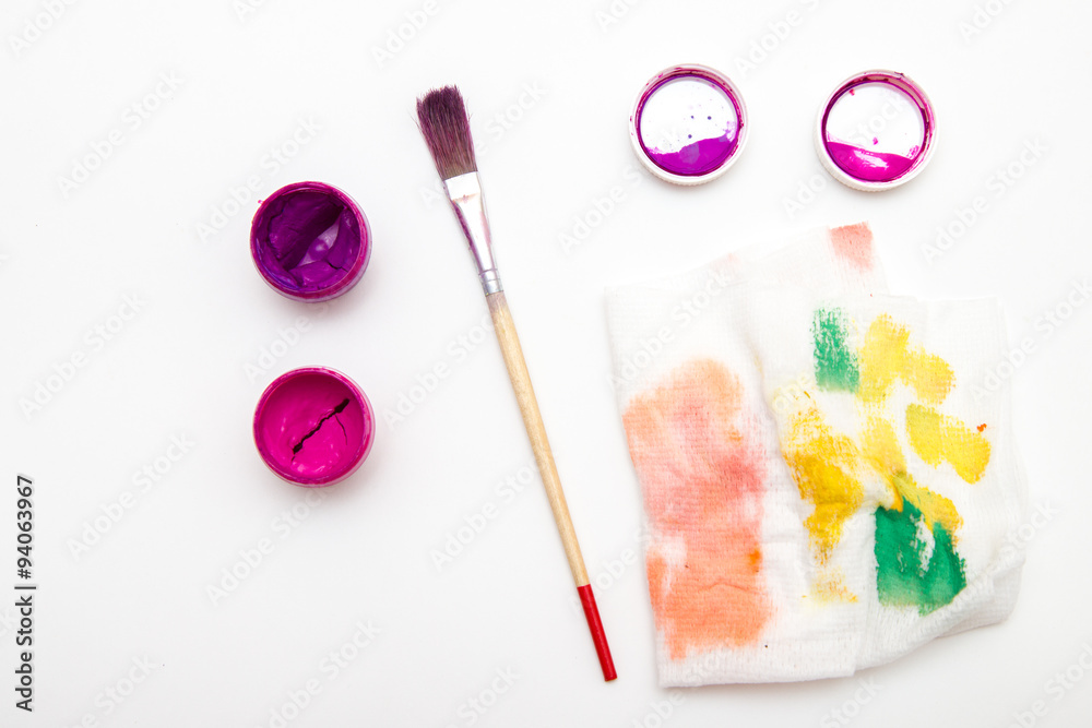 Naklejka premium two open gouache colors with brush and palette