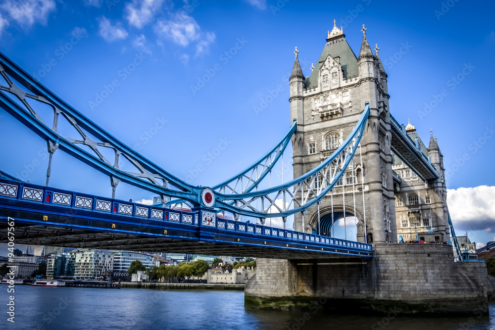 Tower Bridge crosses the River Thames close to the Tower of Lond
