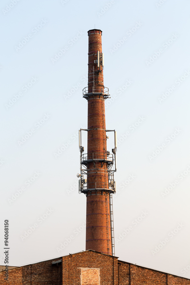 Base transceiver station on the old brick chimney Base transceiver station on the old brick chimney