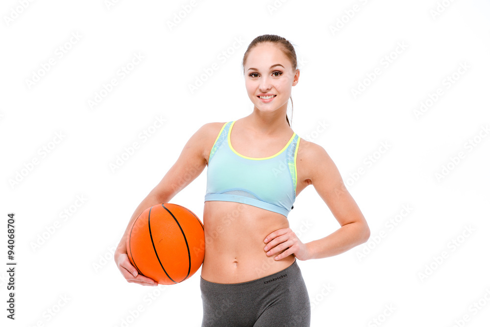 Young sportswoman holding basketball ball