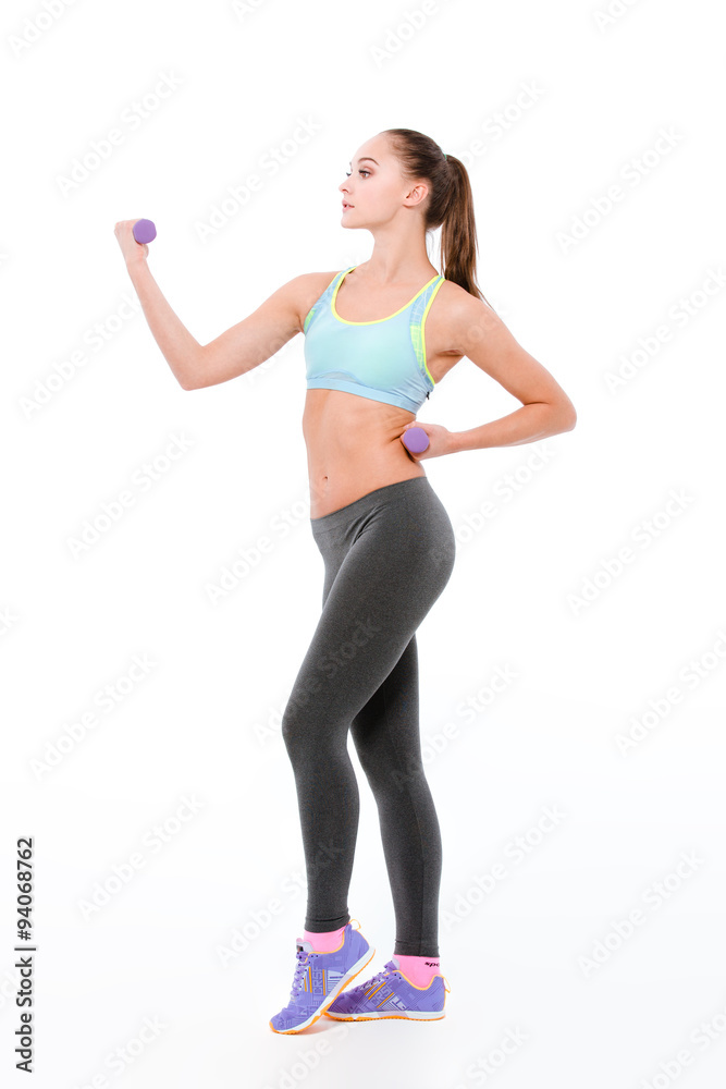 Attractive woman workout with dumbbells Attractive woman workout with dumbbells
