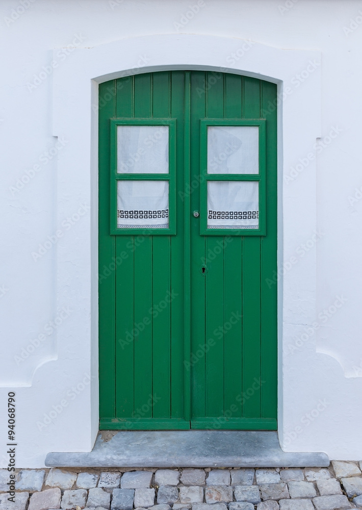 Portuguese traditional wooden doors. Old house.
