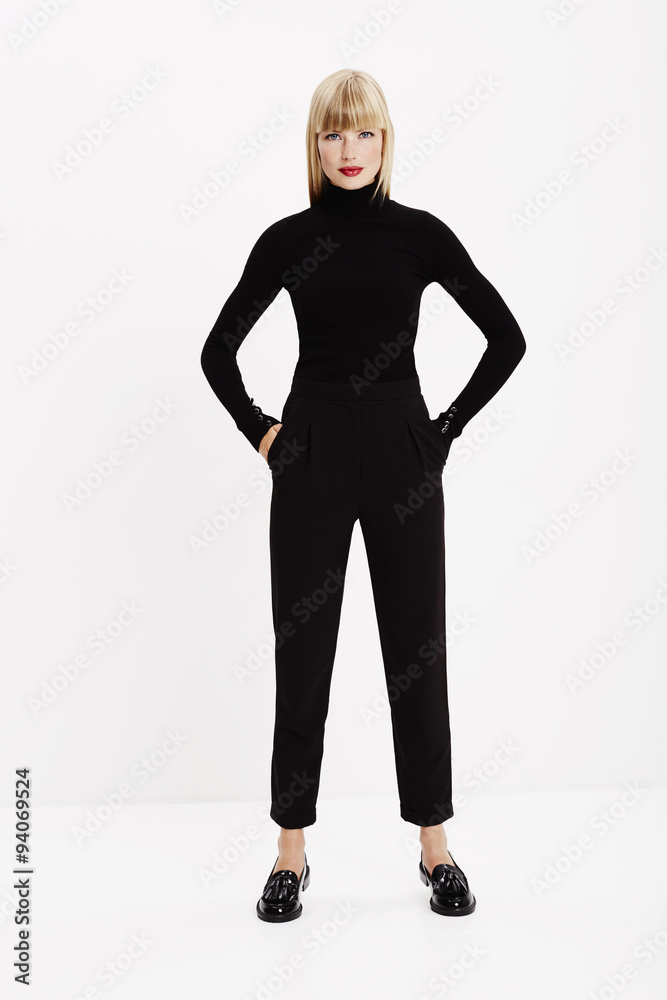 Fototapeta premium Confident young model in black, portrait