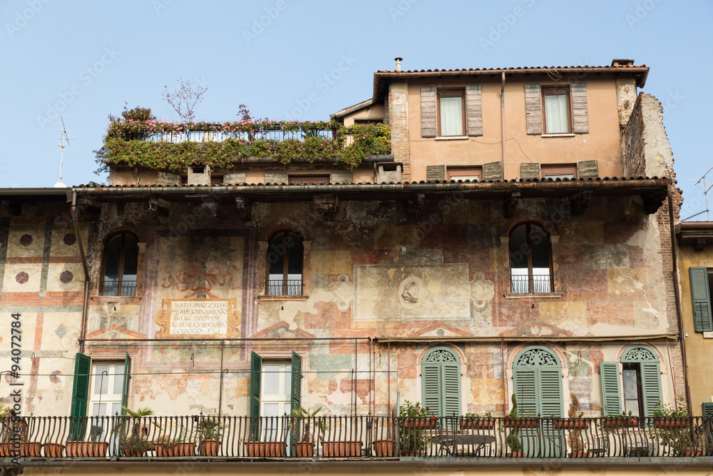 the frescoed Mazzanti Houses on the Piazza delle Erbe, Verona, Italy