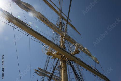Old sailing ship masts sails and rigging