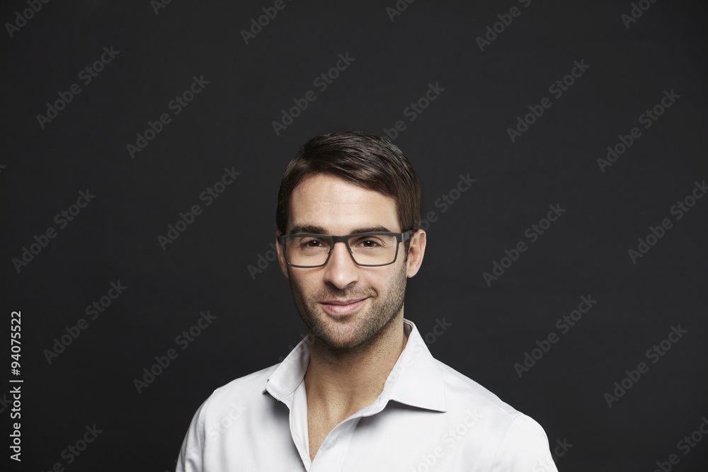 Confident man in spectacles, portrait