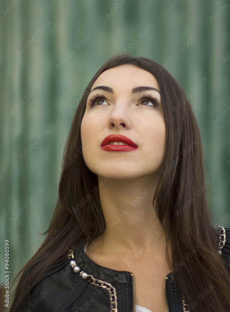 girl with bright red lips looks upwards girl with bright red lips looks upwards