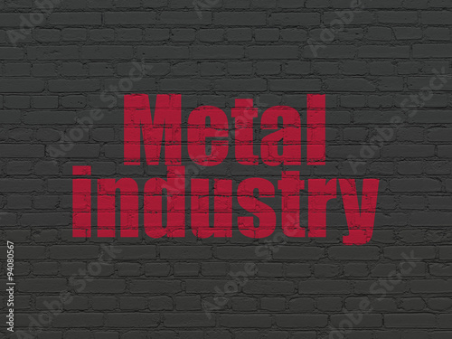 Manufacuring concept: Metal Industry on wall background © Maksim Kabakou
