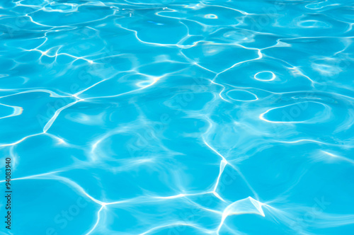 Blue water rippled in swimming pool