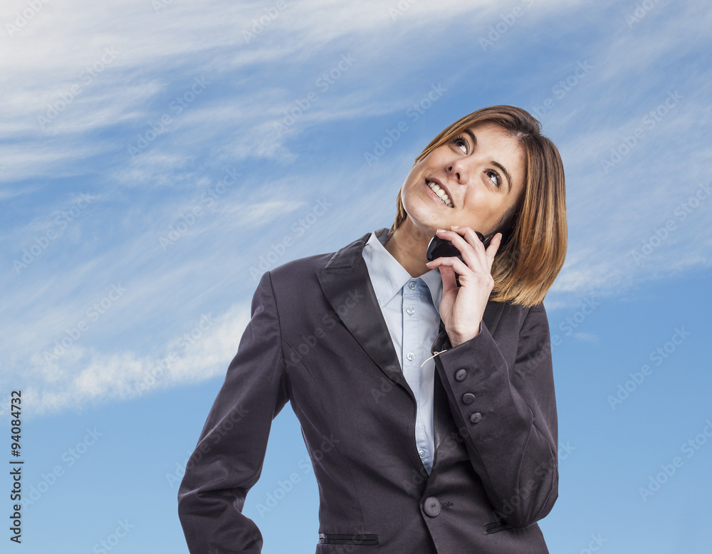 portrait of a business young woman talking on telephone portrait of a business young woman talking on telephone