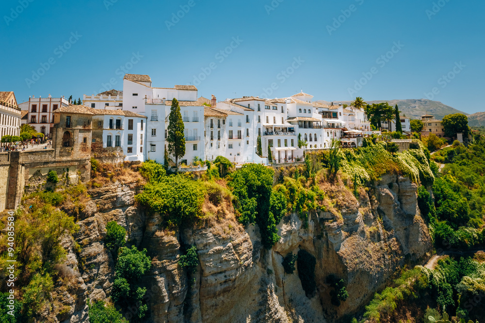 White Traditional Houses Over The Tajo De Ronda Is A Gorge Carve