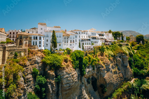 White Traditional Houses Over The Tajo De Ronda Is A Gorge Carve photo