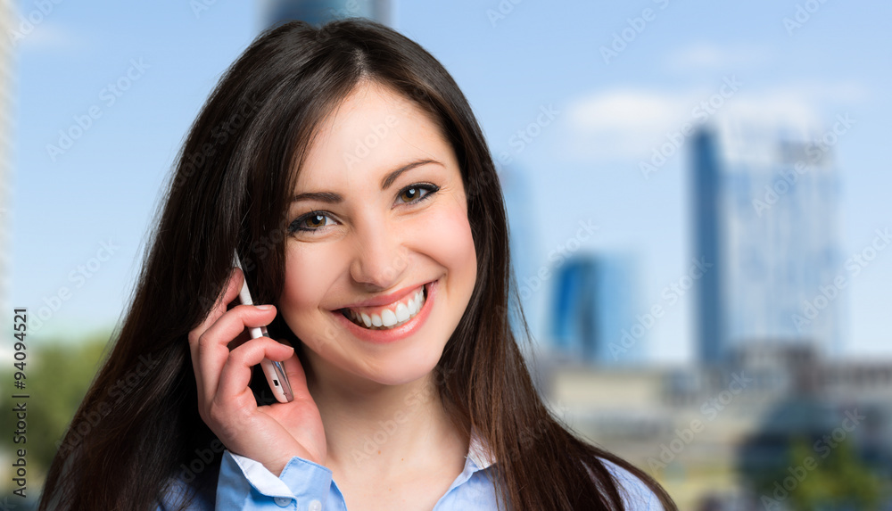 Young businesswoman on the phone outdoor Young businesswoman on the phone outdoor