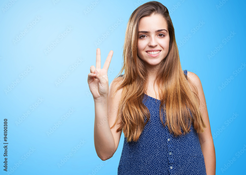 young pretty woman doing number two gesture young pretty woman doing number two gesture