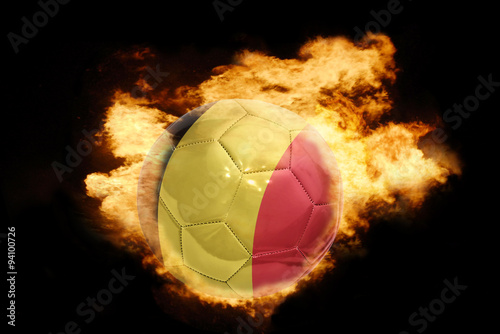 football ball with the flag of belgium on fire