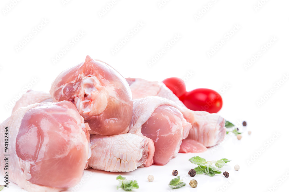 piece raw chicken legs with decor from on side