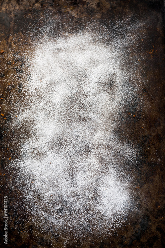 Canvas-taulu Caster sugar on a black tray