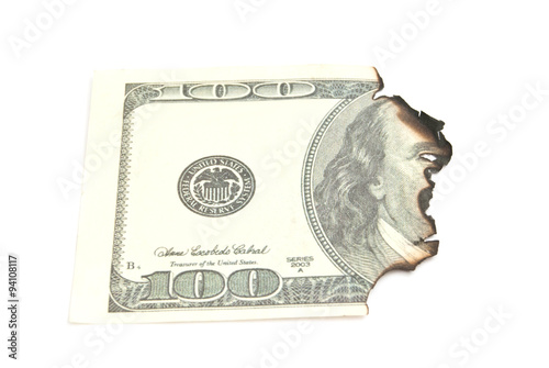 burnt hundred dollar banknote