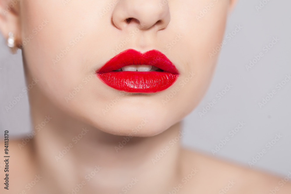 Fototapeta premium Sexy Lips. Beauty Red Lips Makeup. Macro photography