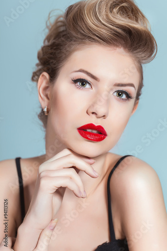 Beauty Portrait of young blonde woman. Hairstyle
