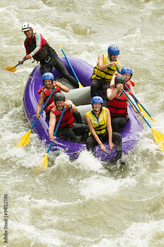 Experience the thrill of whitewater rafting with a group of seven people,perfect for adventure seekers and outdoor enthusiasts.