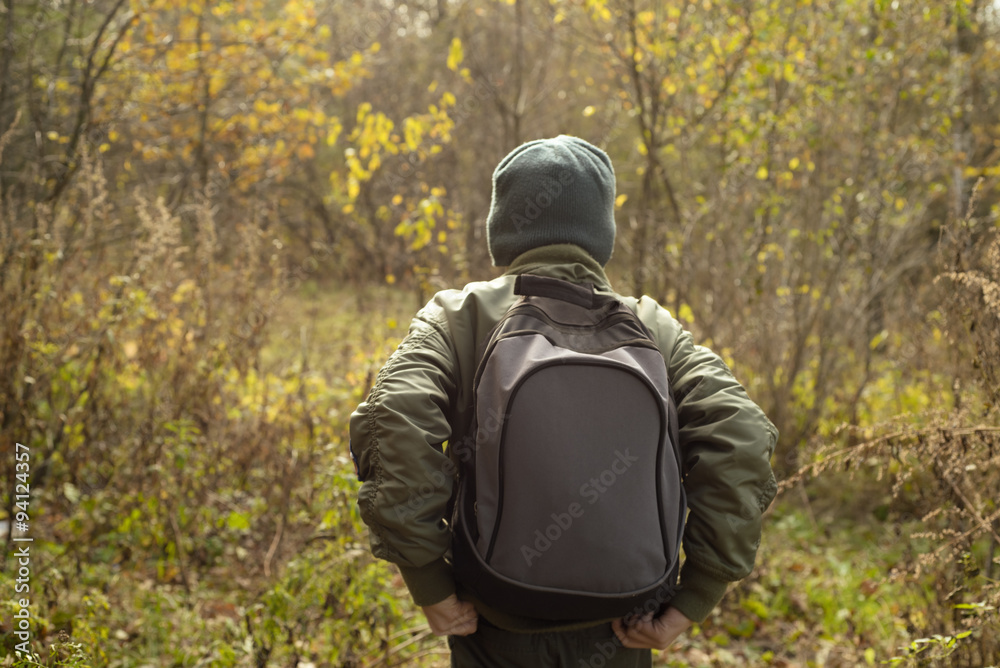 Boy-traveler with a backpack